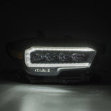 AlphaRex 16-20 Toyota Tacoma NOVA LED Projector Headlight Plank Style Alpha Black w/Activation Light